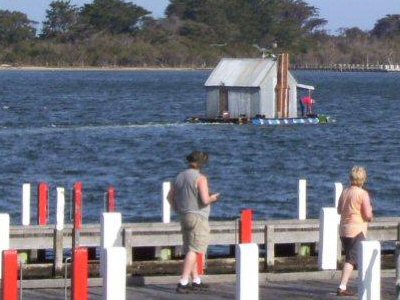 An amazing House Boat at Metung under way