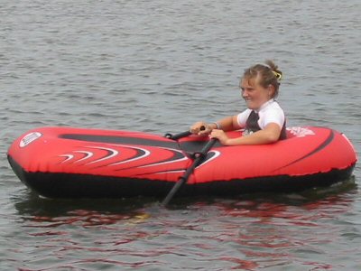 Plastic Inflatable Toy Boat on Lake Tyers