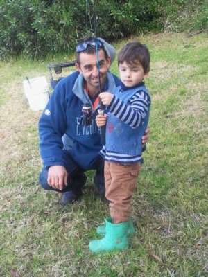 Grant and Buster fishing off the bank