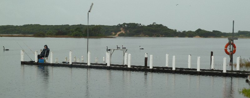 Fishing #2 on the jetty in the rain