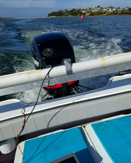 GPS Antenna taped to rod support at back of the boat