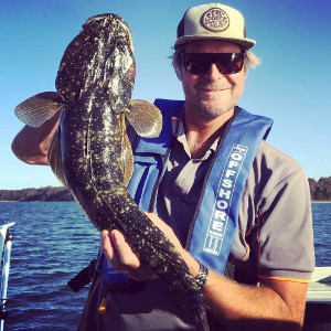 Trent Davis witha pretty cool Flathead at Lake Tyers