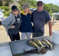 Elise,Trinity and No Fuss Guss with their day's catch  at Lake Tyers