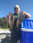 Ray Schmitt with a sample of the days catch at Lake Tyers
